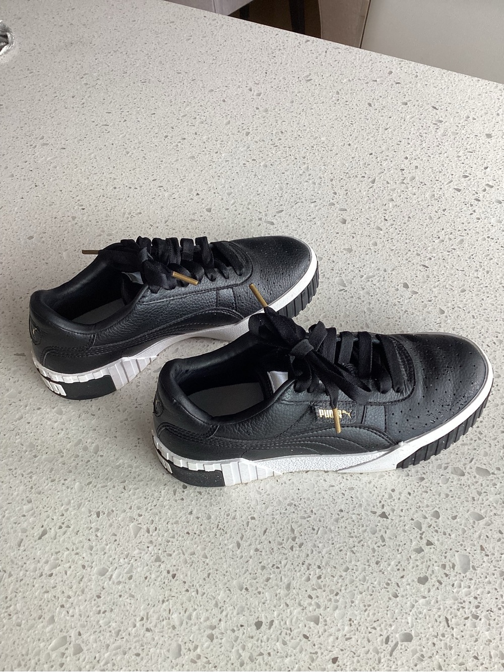 Puma Black Leather Sneakers with Gold Lace Tips